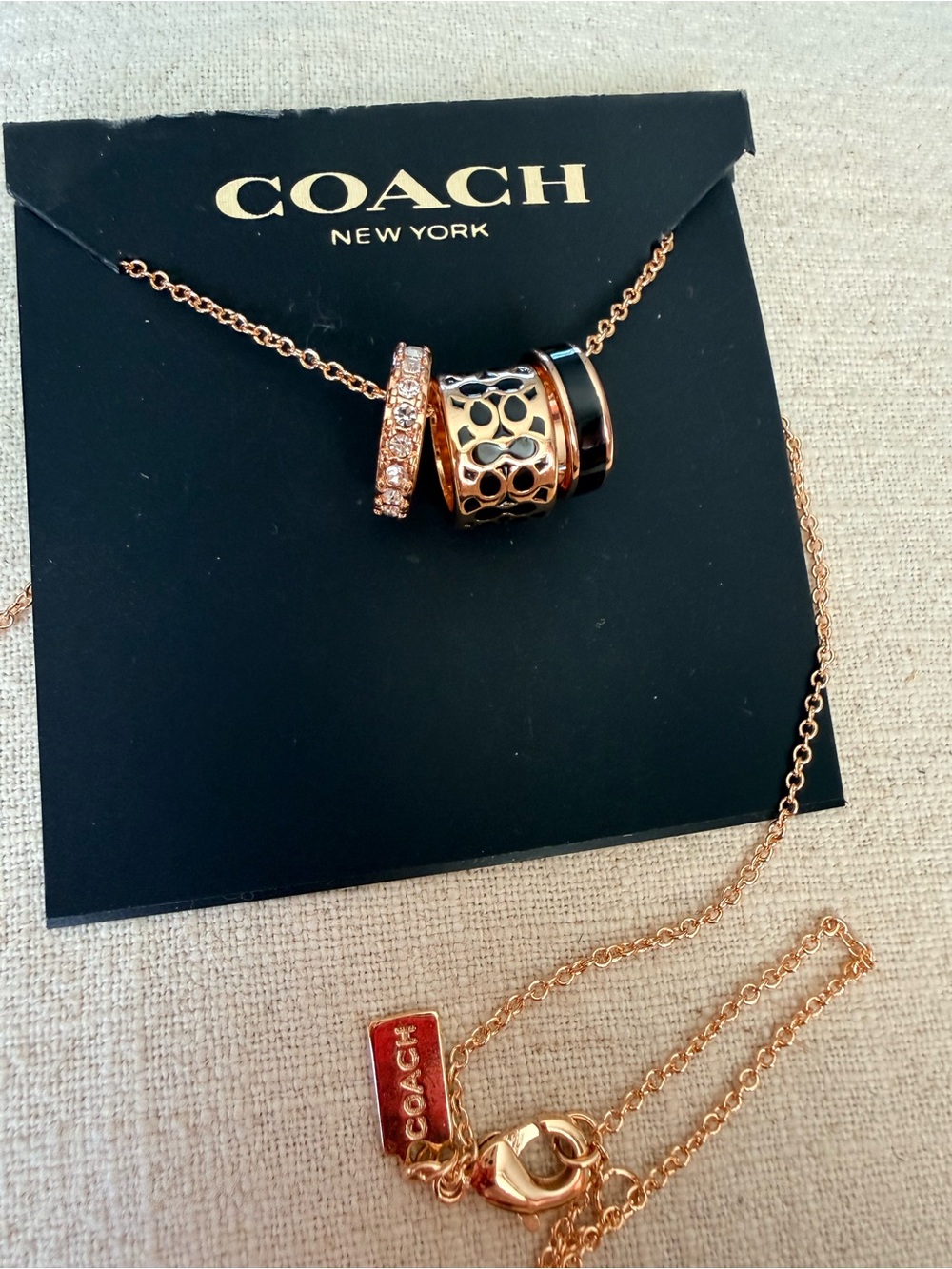 Coach Rose Gold & Black Ring Trio Pendant Necklace